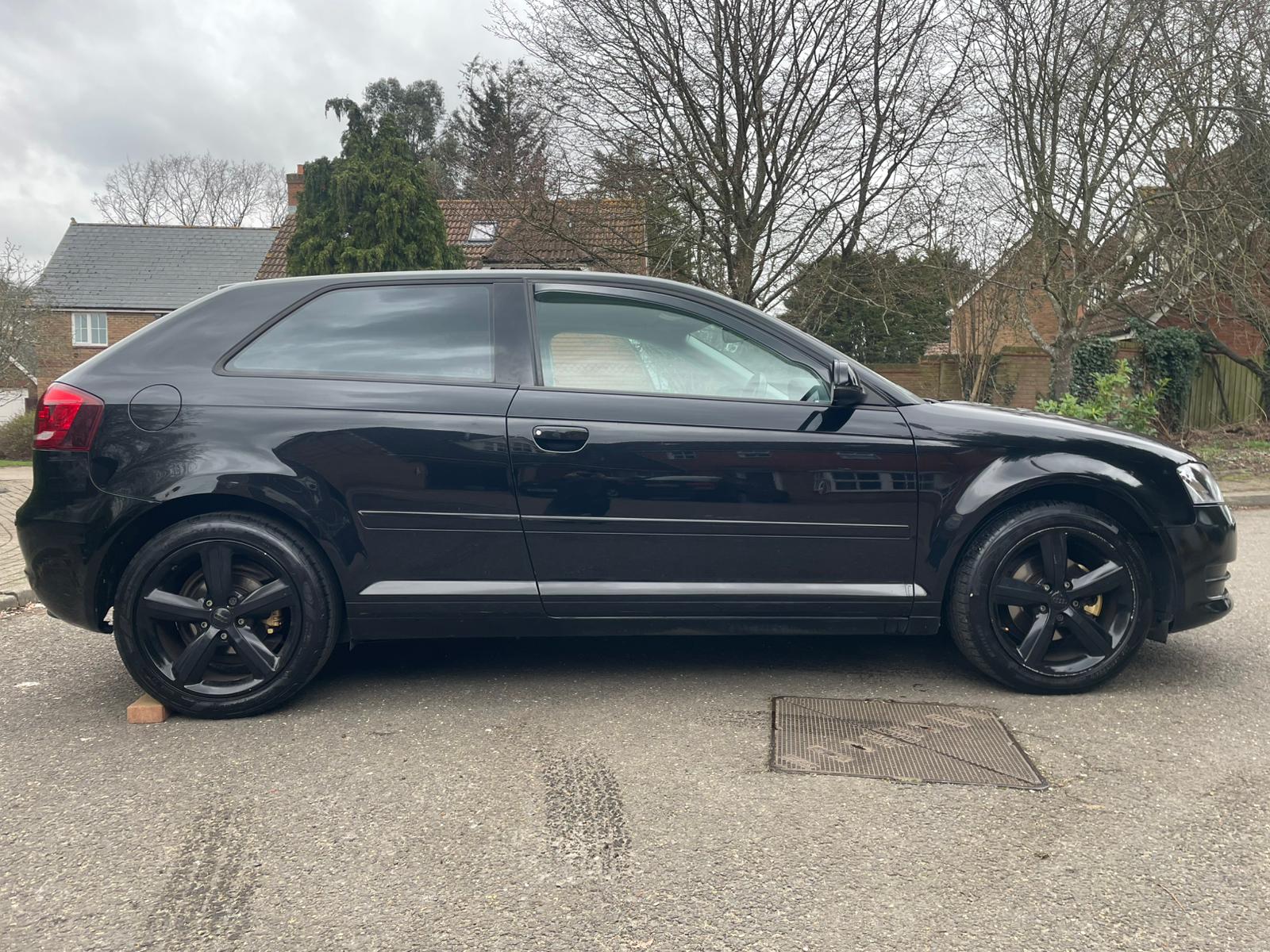 black audi a3 driver side